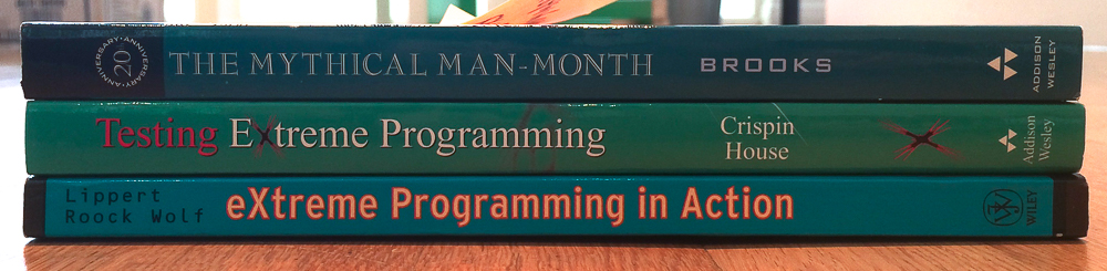 The Mythical Man-Month by Frederick P. Brooks Jr, Testing Extreme Programming by Lisa Crispin and Tip House, Extreme Programming by Martin Lippert, Stefan Roock and Henning Wolf