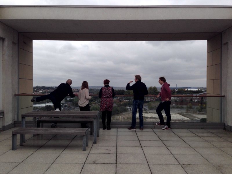 Workshop attendees on a rooftop in Barnsley