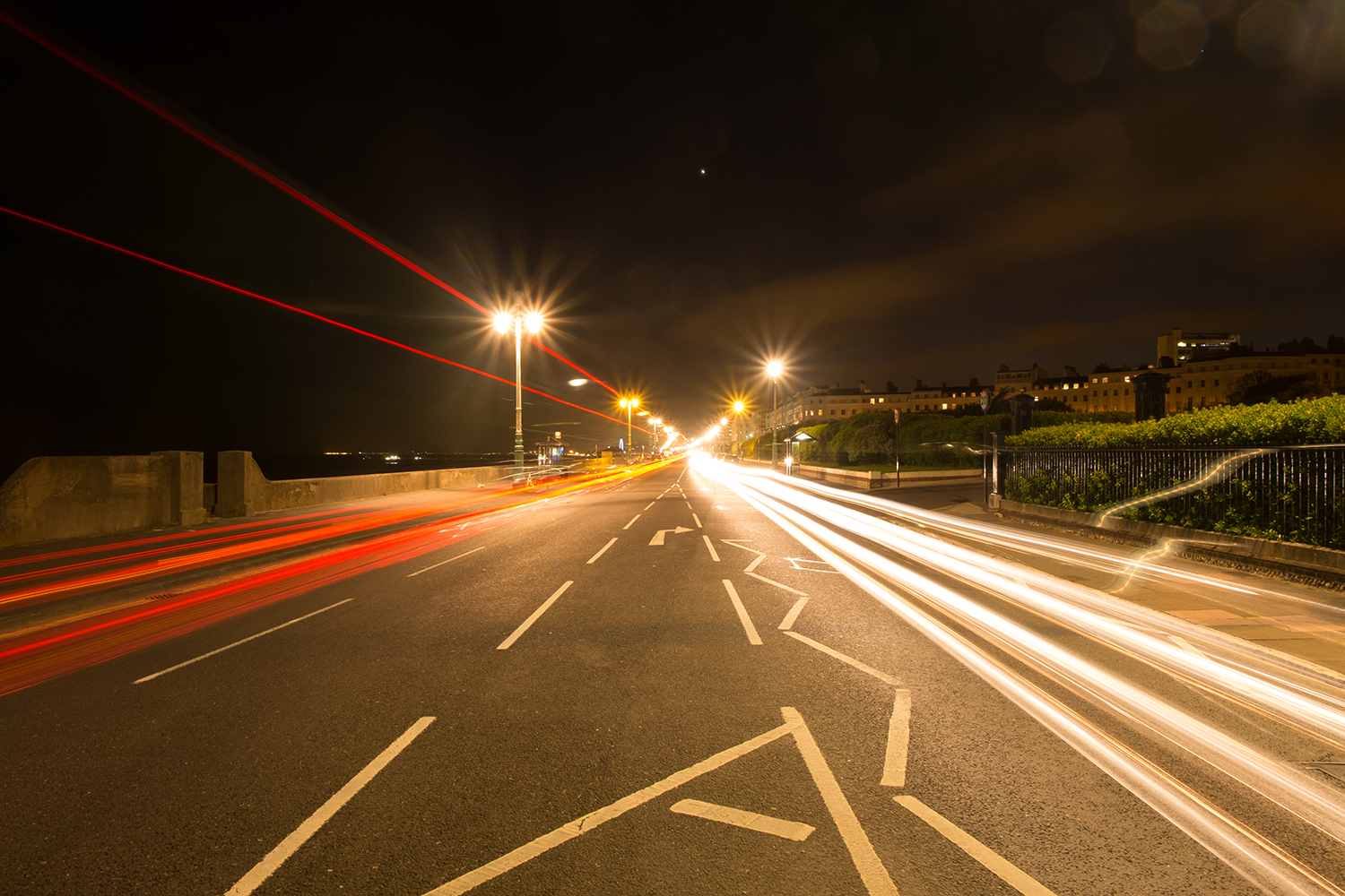 Streaks of light on a road caused by traffic  during a long exposure.