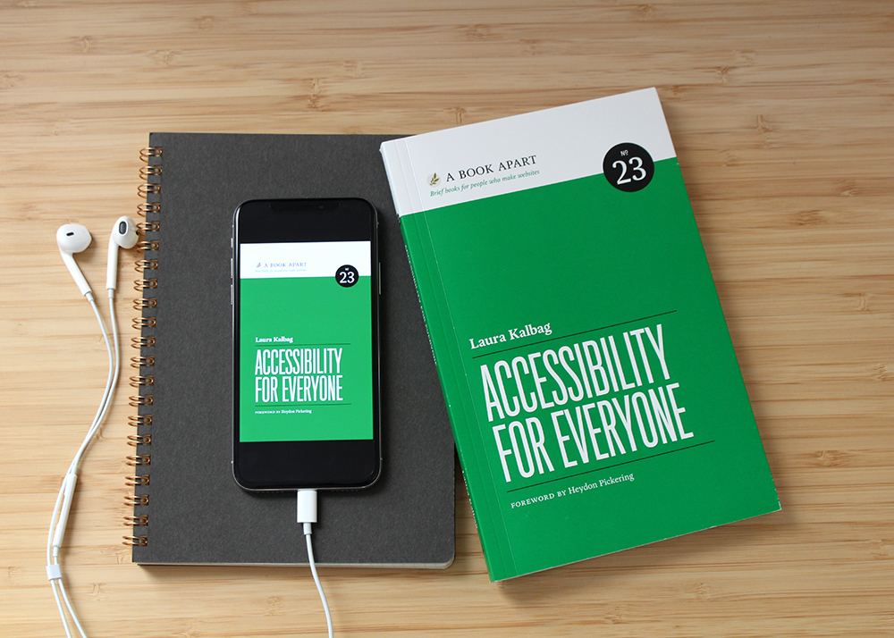 Accessibility For Everyone paperback book alongside an iPod playing the Accessibility For Everyone audiobook.
